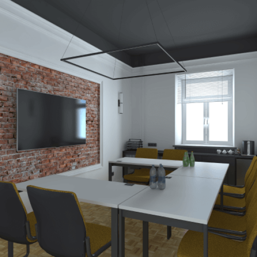 Sala konferencyjna z długim stołem, żółtymi krzesłami, telewizorem na ceglanej ścianie i kwadratową lampą wiszącą.